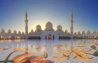 Sheikh Zayed Grand Mosque in Abu Dhabi with white domes, marble courtyards, and reflecting pools.